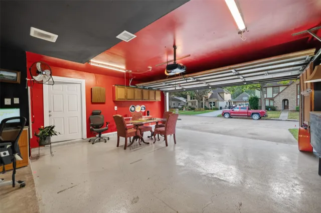a bathroom with a shower and a sink