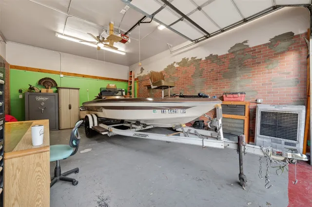 a backyard of a house with outdoor seating