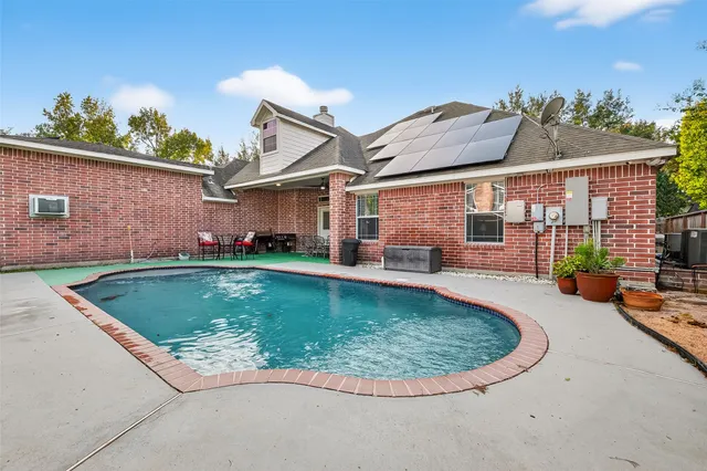 a view of outdoor space yard deck patio and swimming pool