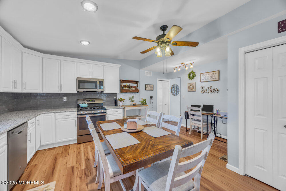 7 Maple Lane Howell, NJ 07731 - Photo 11 of 32 a view of a dining room with furniture