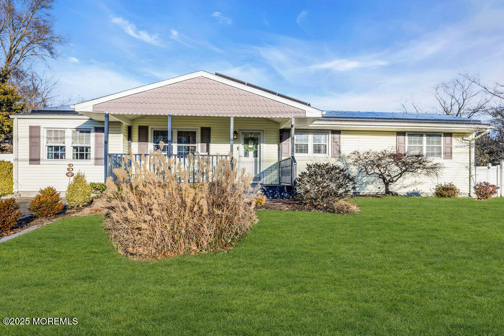 7 Maple Lane Howell, NJ 07731 - Photo 2 of 32 a front view of a house with garden