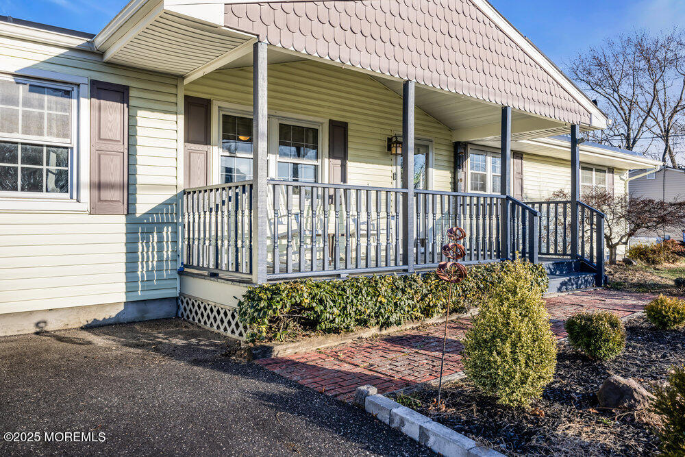 7 Maple Lane Howell, NJ 07731 - Photo 3 of 32 a front view of a house with garden