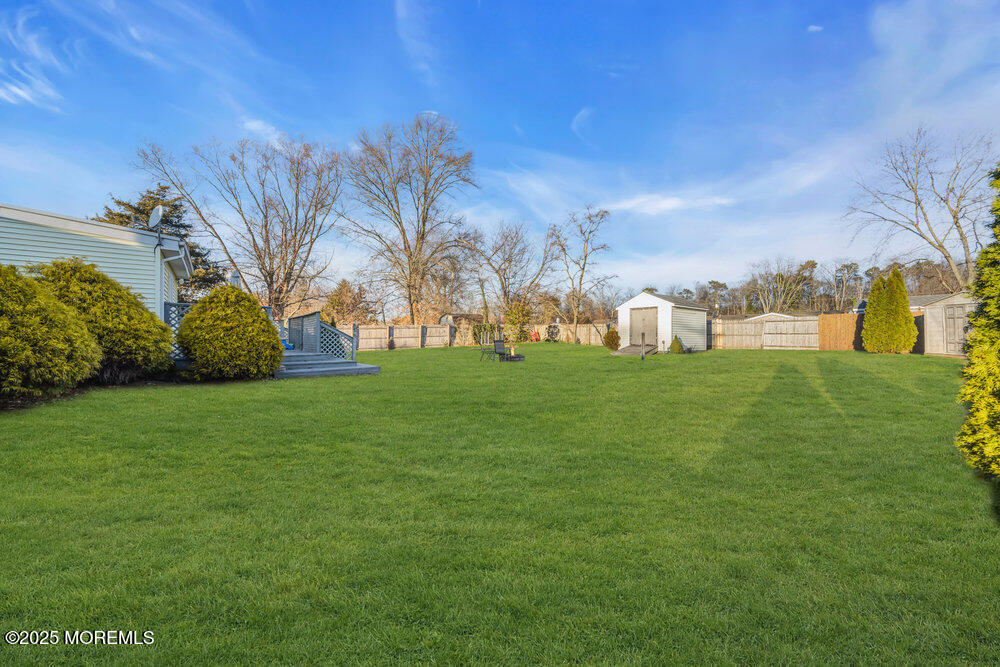 7 Maple Lane Howell, NJ 07731 - Photo 32 of 32 a view of a field with grass and trees