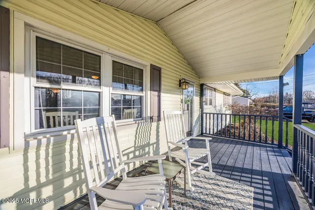front view of a house with a balcony