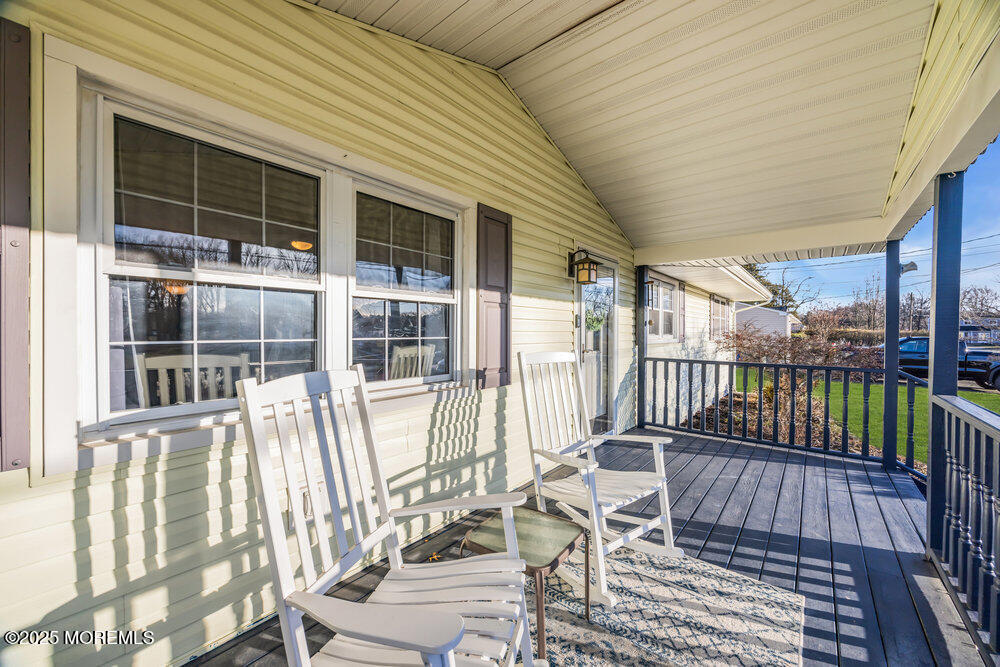 7 Maple Lane Howell, NJ 07731 - Photo 5 of 32 front view of a house with a balcony