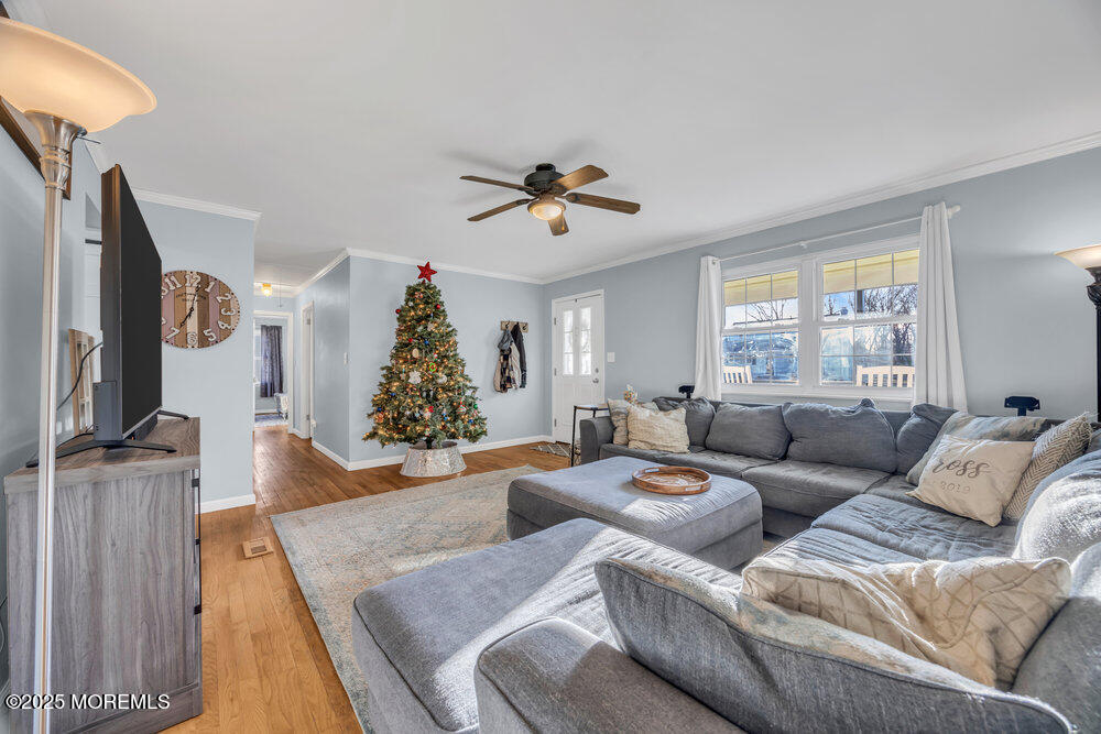7 Maple Lane Howell, NJ 07731 - Photo 6 of 32 a living room with furniture and a flat screen tv