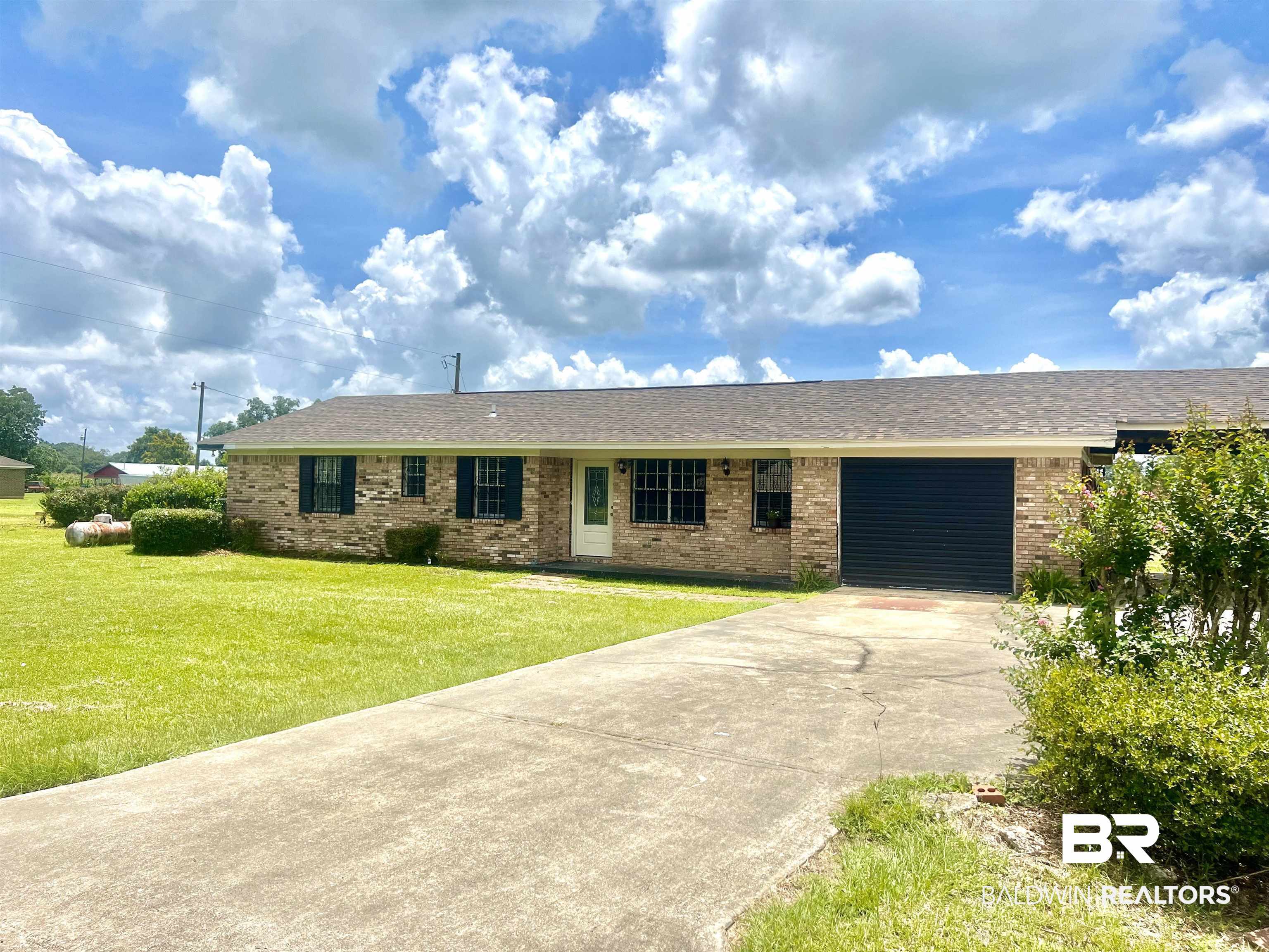 508 Freemanville Drive Atmore, AL 36502 - Photo 3 of 27 Ranch-style home with a front yard
