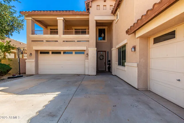 a view of a house with a parking space