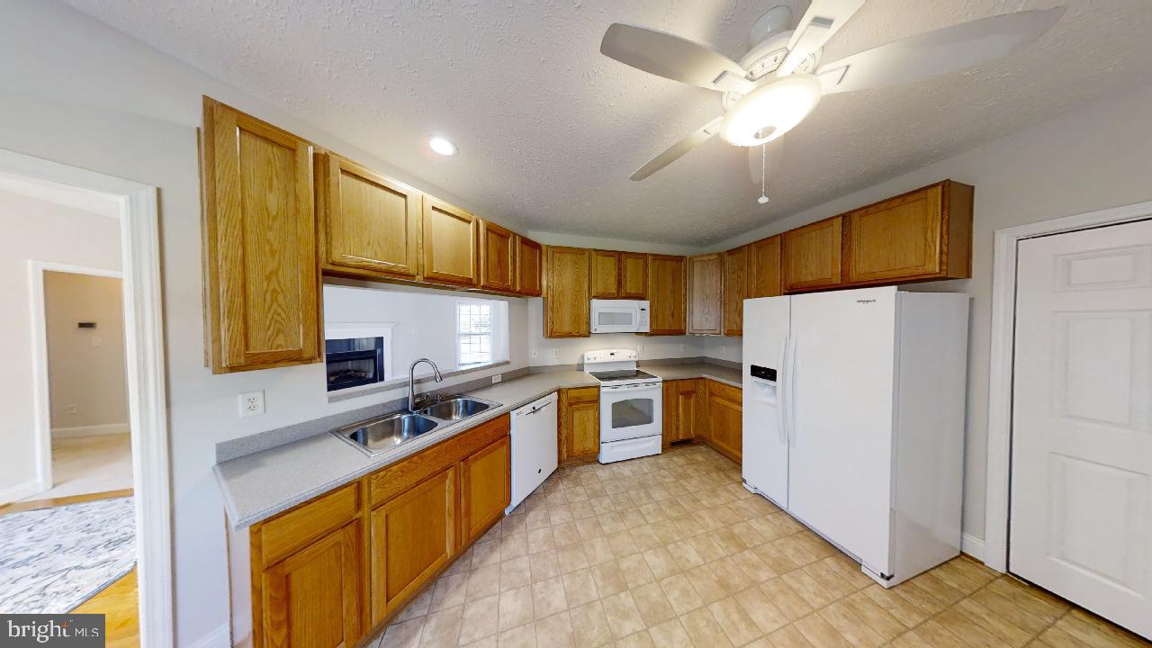 10717 Mt Sharon Road Orange, VA 22960 - Photo 30 of 44 kitchen and laundry room to right