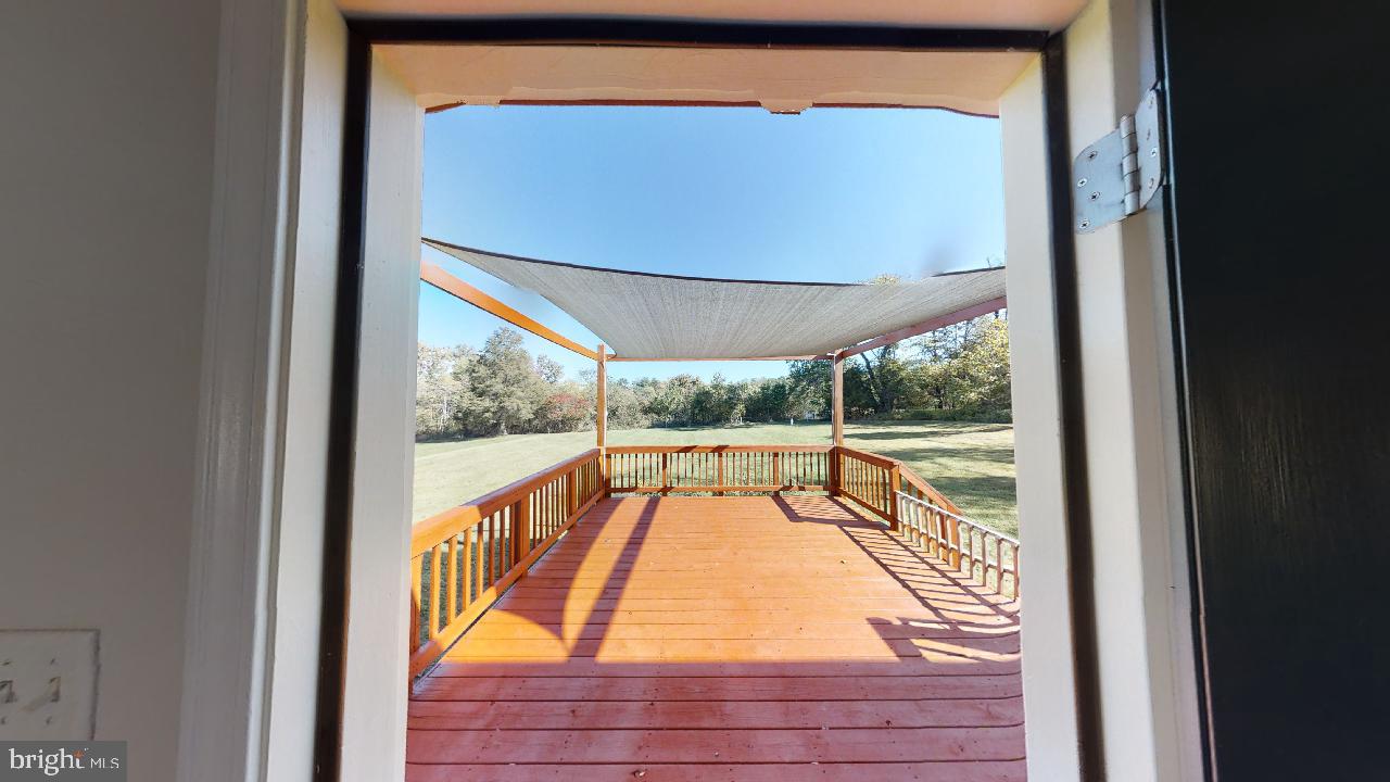 10717 Mt Sharon Road Orange, VA 22960 - Photo 32 of 44 back deck from living area