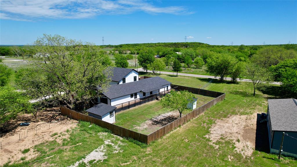 51 3rd Street Graford, TX 76449 - Photo 5 of 40 an aerial view of a house with garden
