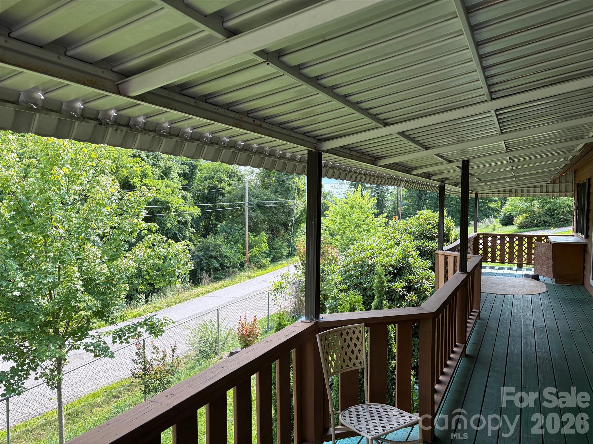 256 A Bruce Road Mars Hill, NC 28754 - Photo 35 of 39 a balcony with wooden floor in outdoor space