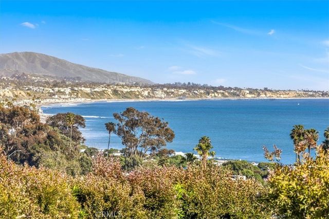 a view of lake with mountain