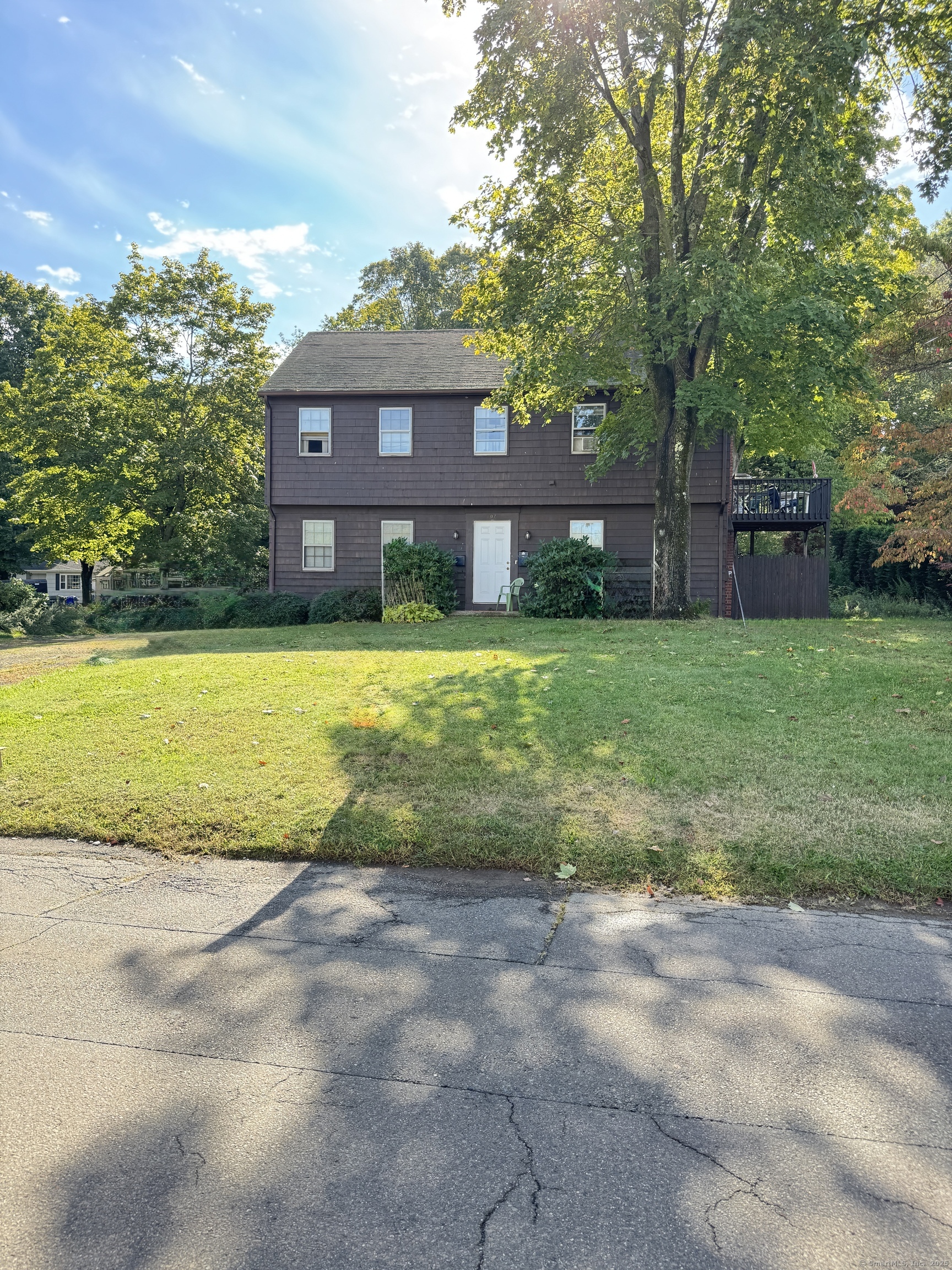 107 Chestnut Street Branford, CT 06405 - Photo 1 of 1 a view of a house with backyard and a tree