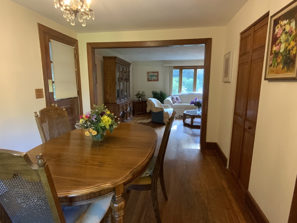 1177 Edgell Road Framingham, MA 01701 - Photo 12 of 32 a view of a dining room with furniture and wooden floor
