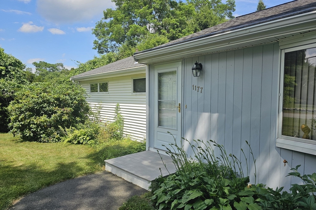 1177 Edgell Road Framingham, MA 01701 - Photo 2 of 32 a view of a house with a yard