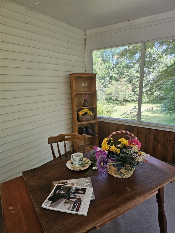 1177 Edgell Road Framingham, MA 01701 - Photo 26 of 32 a view of a dining room with furniture window and outside view