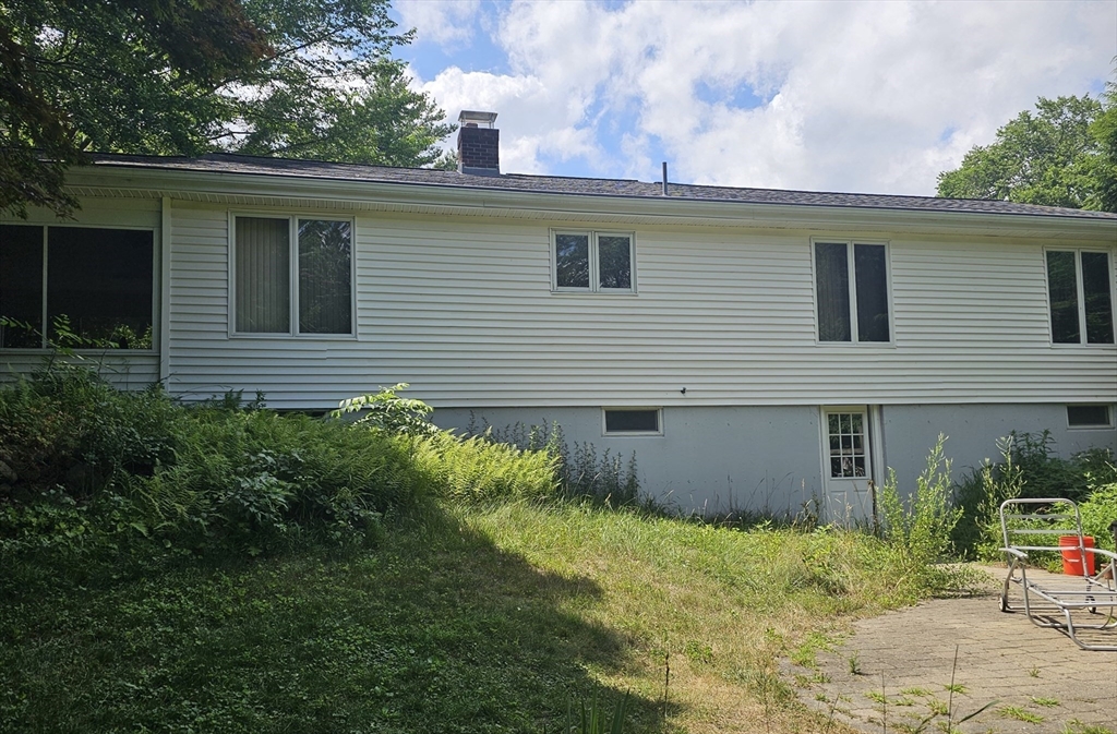 1177 Edgell Road Framingham, MA 01701 - Photo 3 of 32 a view of a house with a yard