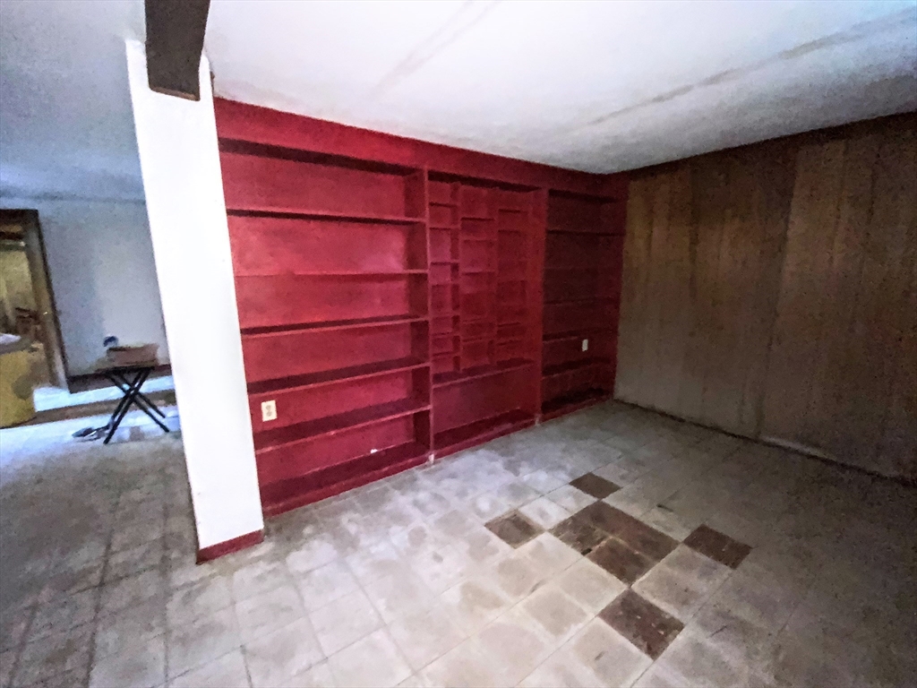 1177 Edgell Road Framingham, MA 01701 - Photo 31 of 32 a room with a furniture and a window
