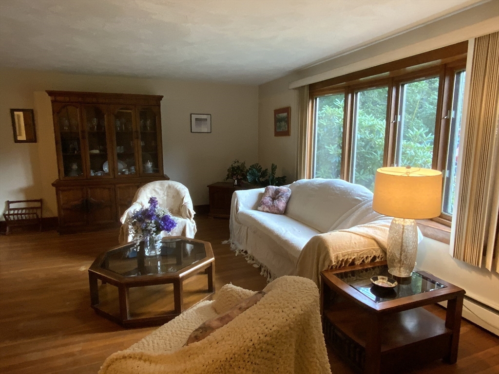 1177 Edgell Road Framingham, MA 01701 - Photo 6 of 32 a living room with furniture and wooden floor