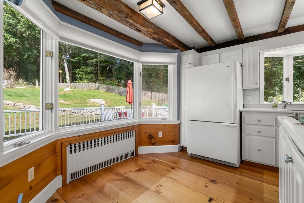 45 Winch Street Framingham, MA 01701 - Photo 17 of 40 a view of a kitchen with a large window