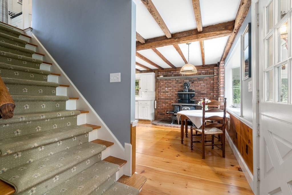 45 Winch Street Framingham, MA 01701 - Photo 19 of 40 a view of entryway and hall with wooden floor