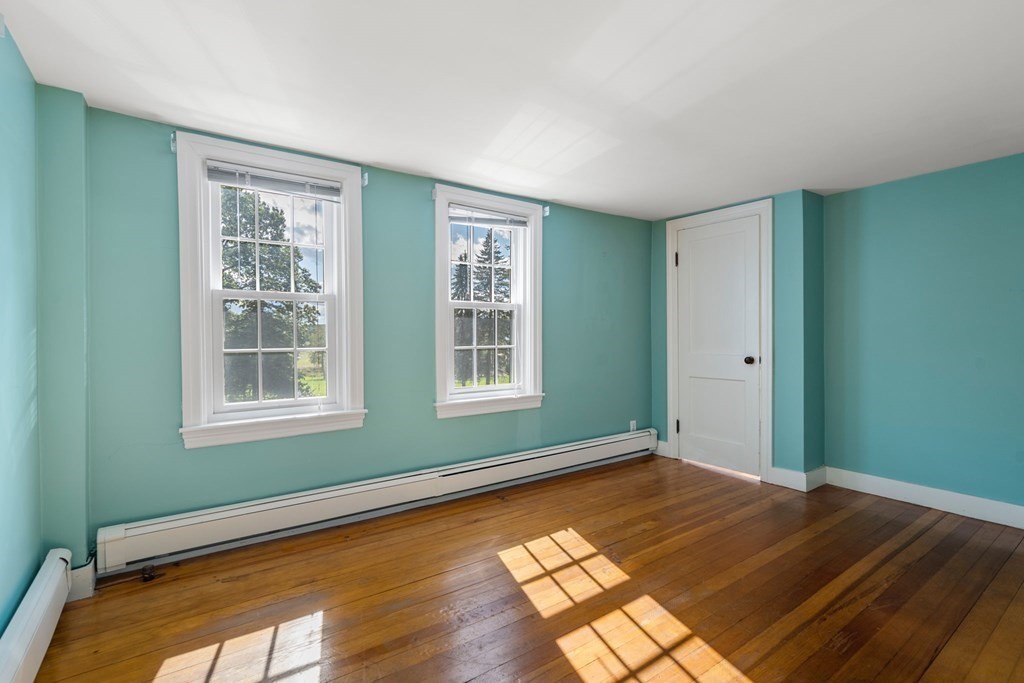 45 Winch Street Framingham, MA 01701 - Photo 25 of 40 a view of a room with wooden floor and windows