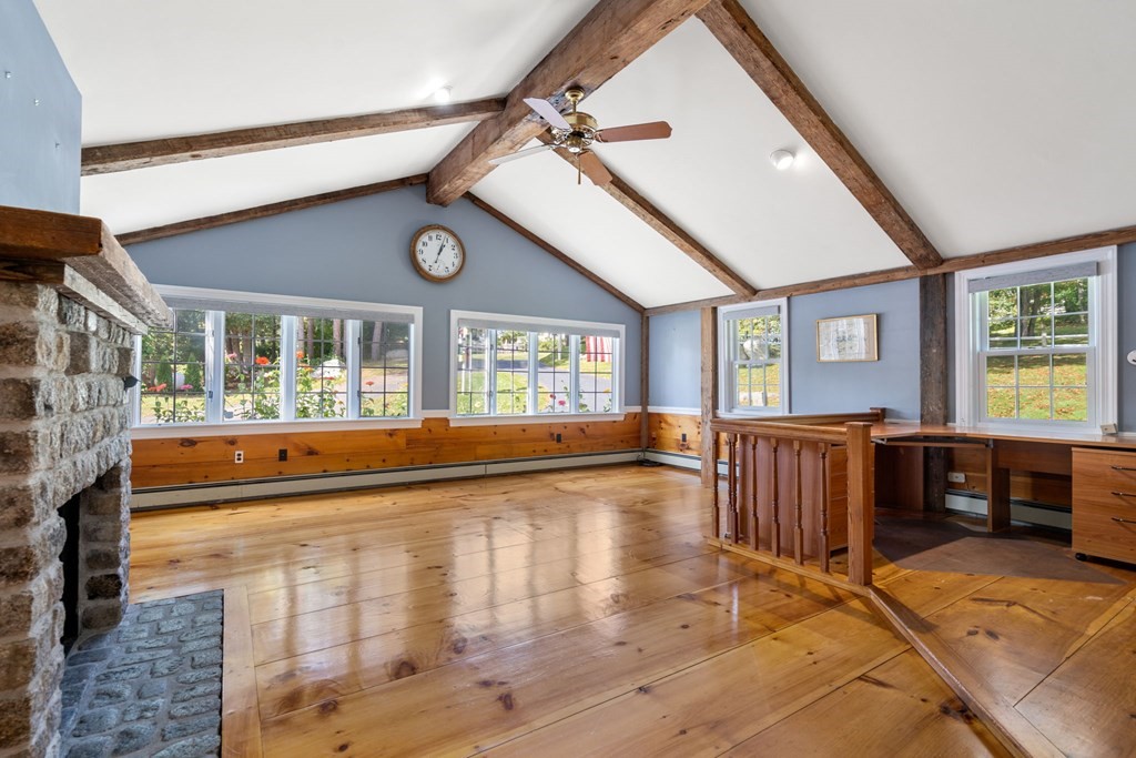 45 Winch Street Framingham, MA 01701 - Photo 33 of 40 a large hall with wooden floor and furniture