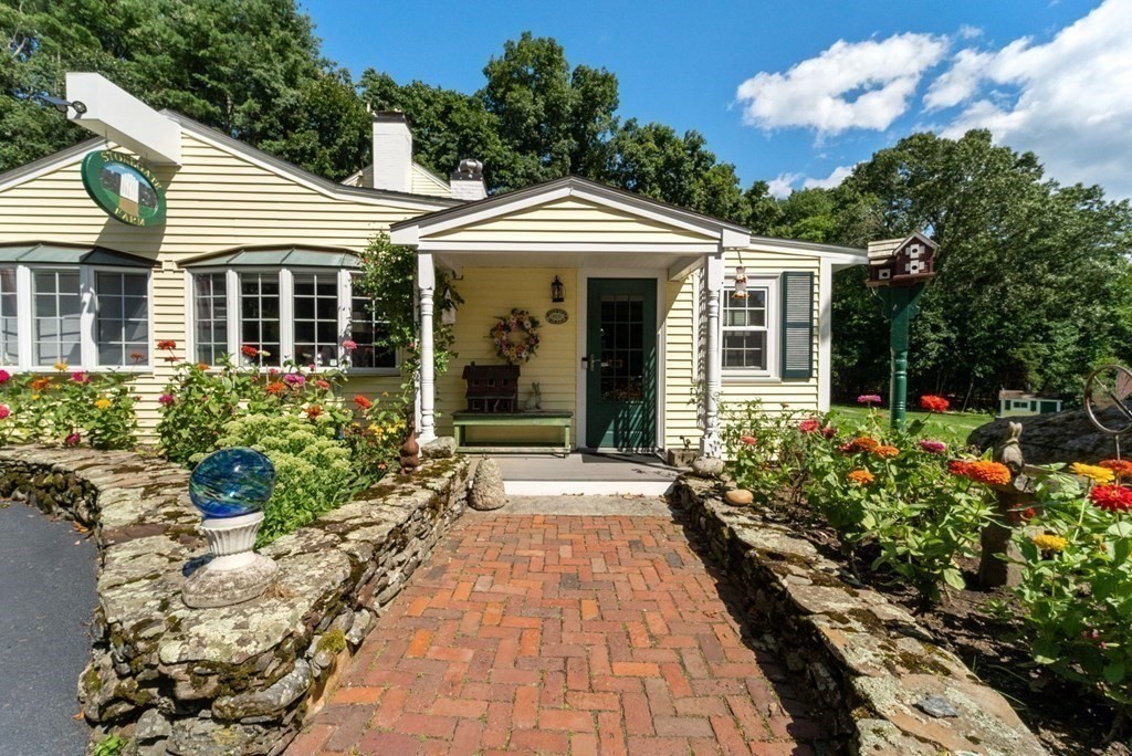 45 Winch Street Framingham, MA 01701 - Photo 6 of 40 front view of a house with a porch