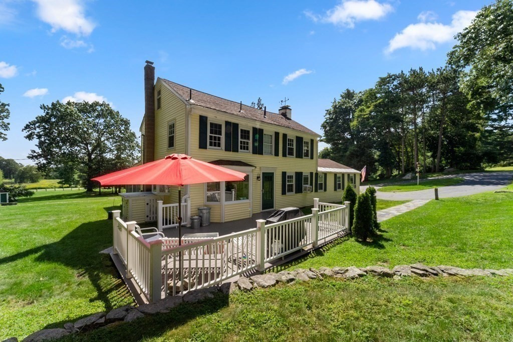 45 Winch Street Framingham, MA 01701 - Photo 10 of 40 a front view of a house with garden