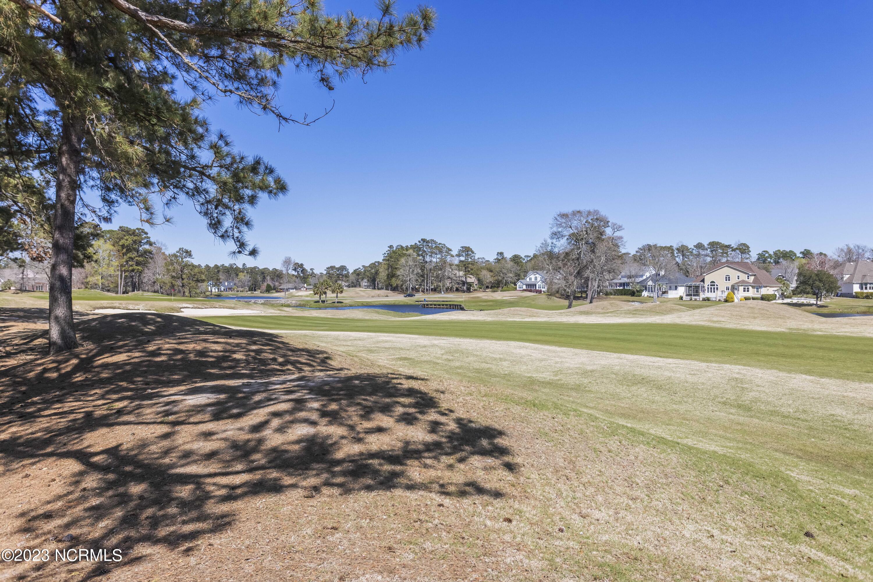 182 Clubhouse Road, Unit 2 Sunset Beach, NC 28468 - Photo 32 of 38 Clubhouse 7 golf view