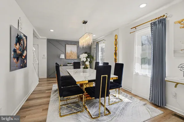 a view of a dining room with furniture