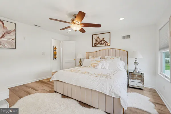 a bathroom with a toilet and shower
