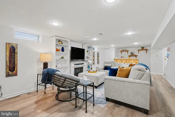 a view of a workspace with furniture