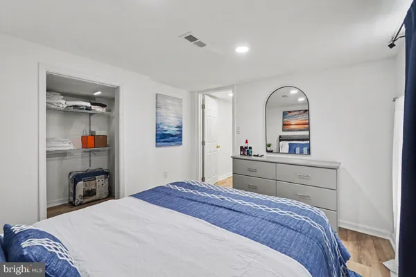 a front view of a house with outdoor seating