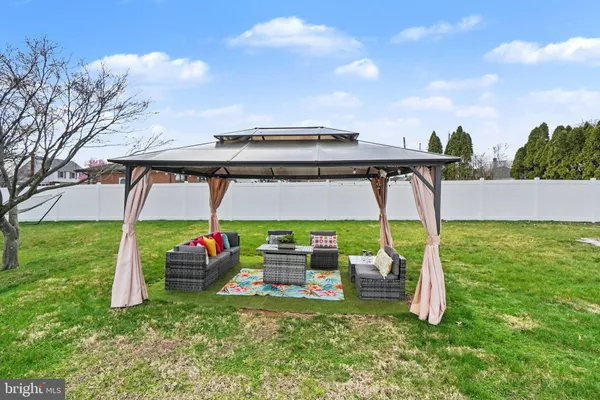 an aerial view of a swimming pool patio and mountain view