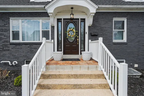 a front view of a house with entryway