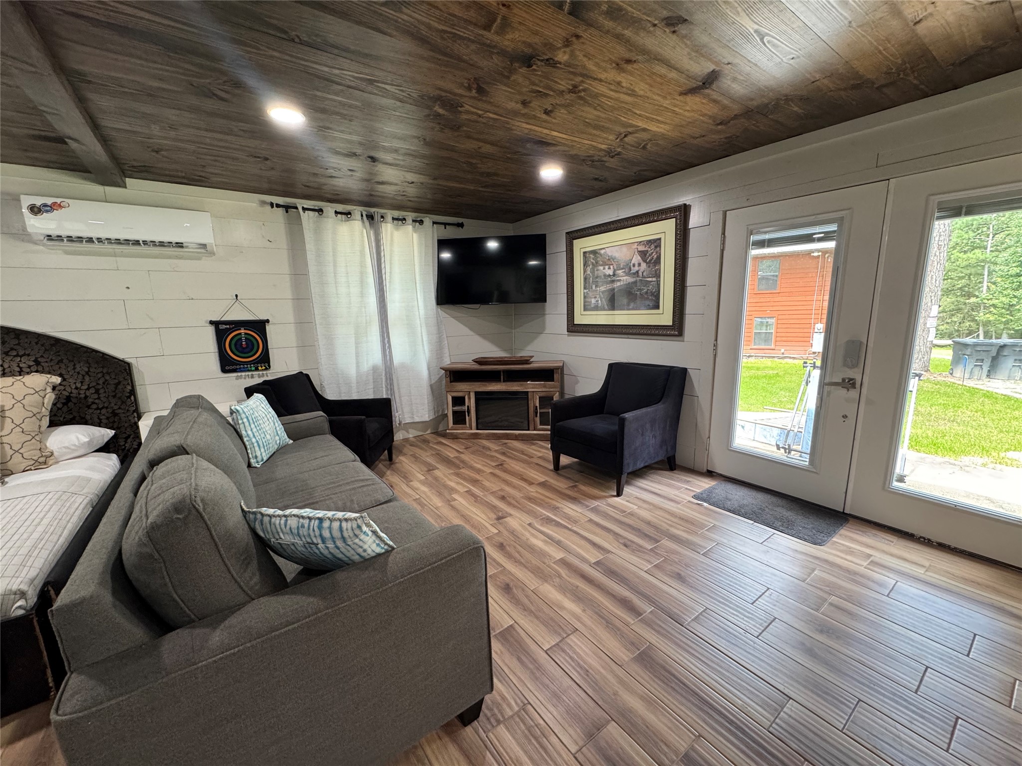 10 Boat Launch Road, Unit B Point Blank, TX 77364 - Photo 8 of 9 a living room with furniture and a window