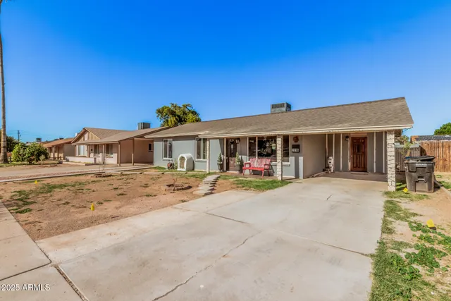 a front view of a house with patio