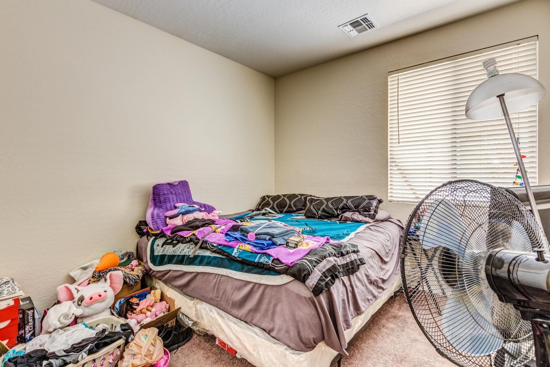 2928 West Shumway Farm Road Phoenix, AZ 85041 - Photo 22 of 28 Bedroom 3