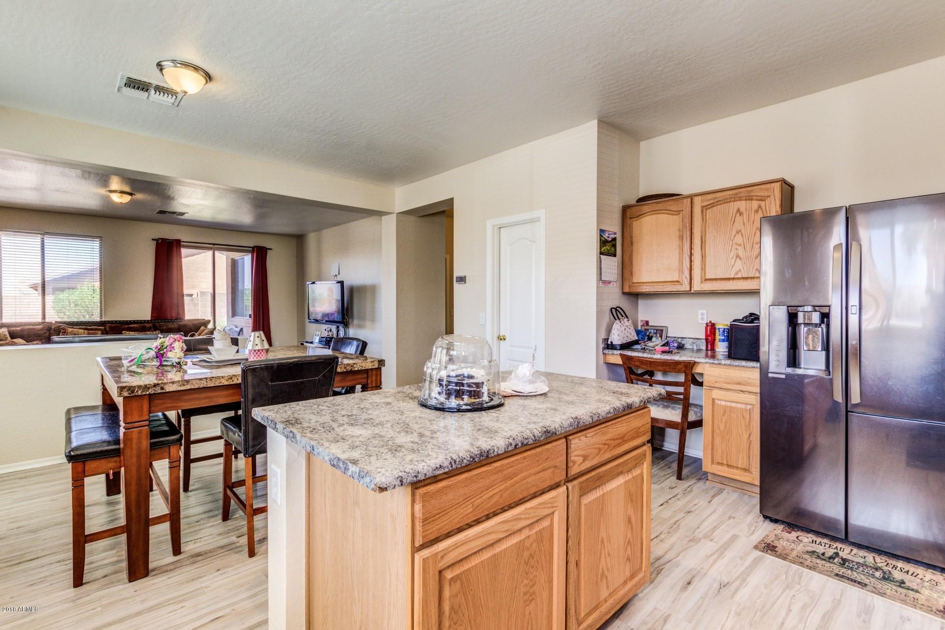 2928 West Shumway Farm Road Phoenix, AZ 85041 - Photo 8 of 28 Kitchen, Dining Area, & FR II