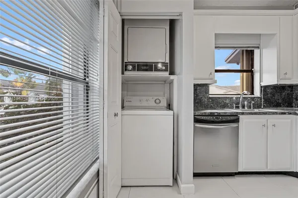 a kitchen with a stove and a microwave