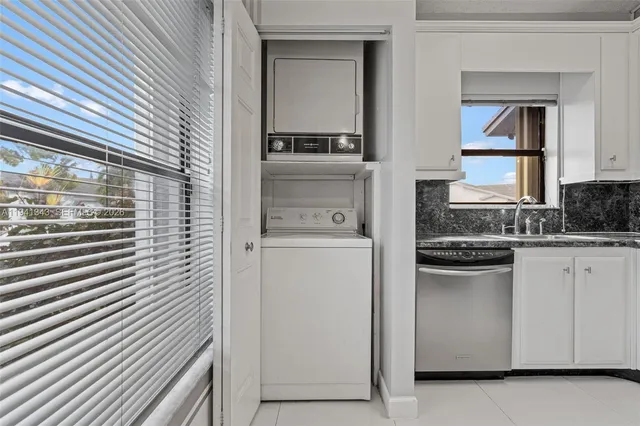a kitchen with a stove and a microwave