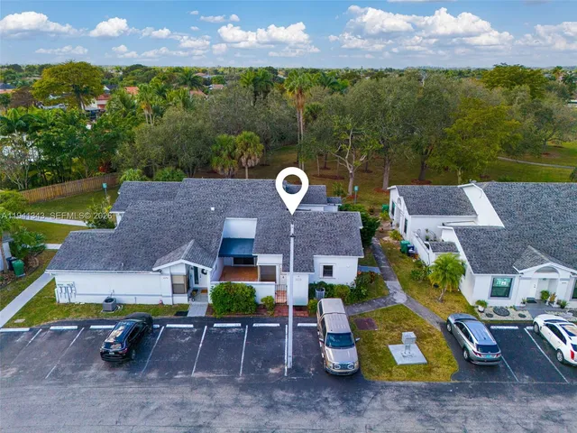 a car parked in front of a house