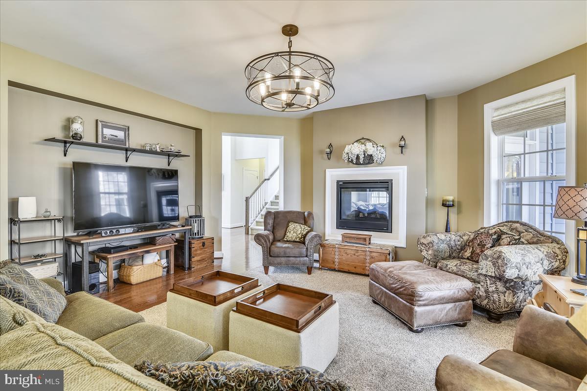 4431 Spring Run Road Warrenton, VA 20187 - Photo 16 of 71 Family & LR share the double sided gas fireplace
