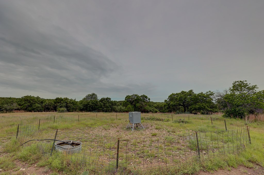 8177 Wendel Road Harper, TX 78631 - Photo 25 of 32 a view of a lake with a yard