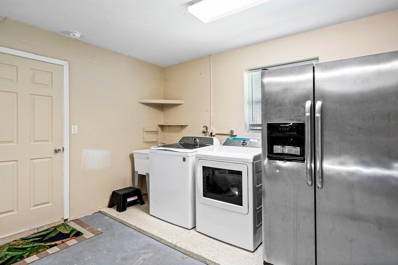 5221 Northeast 26th Avenue Lighthouse Point, FL 33064 - Photo 13 of 13 Laundry in Garage