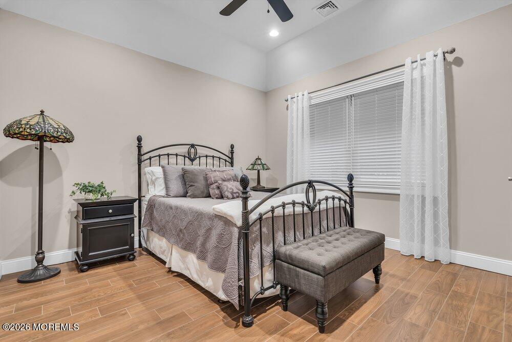 224 Grawtown Road Jackson, NJ 08527 - Photo 20 of 33 a bedroom with furniture and a ceiling fan