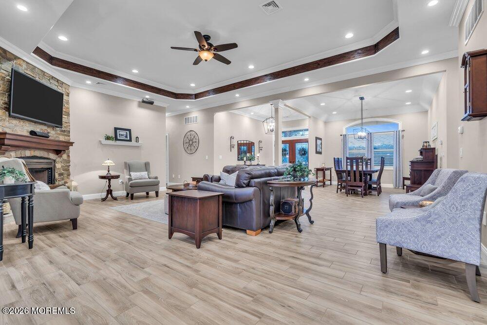 224 Grawtown Road Jackson, NJ 08527 - Photo 6 of 33 a living room with lots of furniture and kitchen view