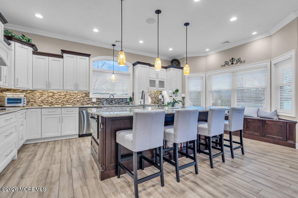 224 Grawtown Road Jackson, NJ 08527 - Photo 9 of 33 a large kitchen with a table and chairs